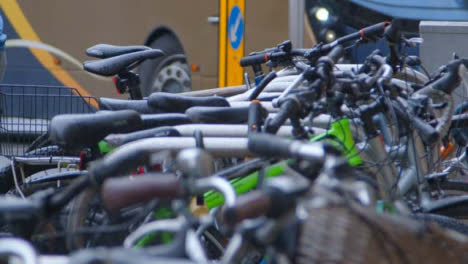 Sliding-Shot-Revealing-Public-Bicycle-Rack-In-Rain