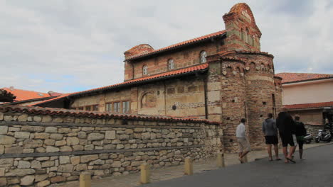 Nessebar-Bulgaria-St-Stefan-Church-with-tourists-walking-by