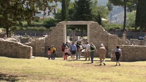 Croatia-Salona-tourists-enter-Roman-ruins