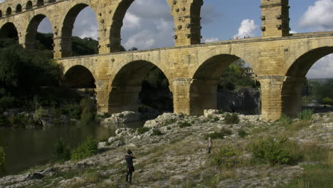 France-people-by-the-Pont-du-Gard