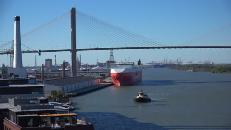 Savannah-River-Georgia-view-with-tug-and-orange-ship