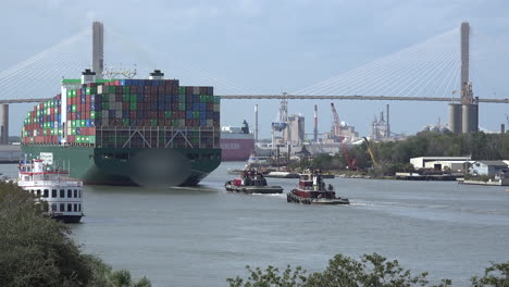 Georgia-cargo-ship-followed-by-tug-boat-on-the-Savannah-River