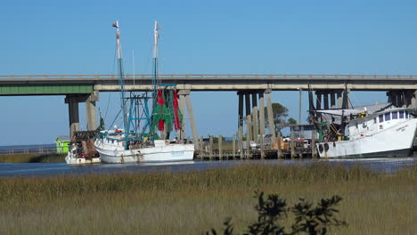 Shrimp-boats-by-bridge-to-Tybee-Island-Georgia-pan