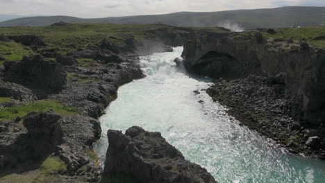 Iceland-Godafoss-river-beyond-lower-waterfall