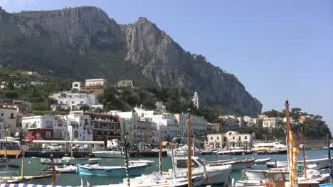 Italy-Capri-mountain-above-boat-harbor
