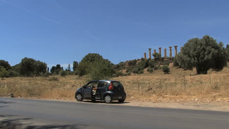 Italy-Sicily-Agrigento-car-and-ruins