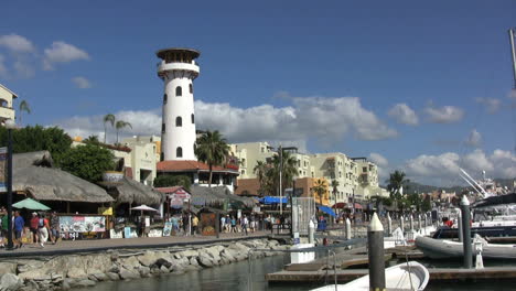 Mexico-Baja-California-Cabo-San-Lucas-walk-with-tourists