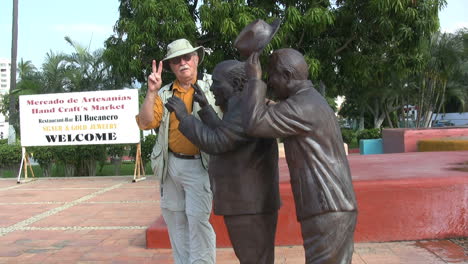 Mexico-Puerto-Vallarta-tourist-with-statues