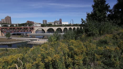 Minneapolis-Minnesota-Stone-Arch-Bridge-and-goldenrod