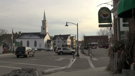 Newmarket-New-Hampshire-town-street-with-church-and-sign