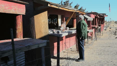 New-Mexico-Laguna-Pueblo-stands-with-tourist