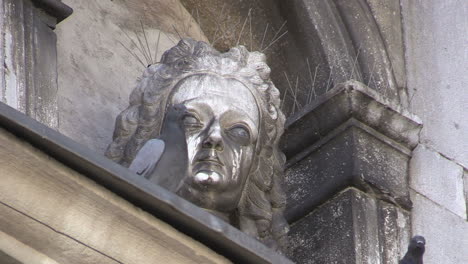 Koper-Slovenia-carving-of-head-with-pigeons