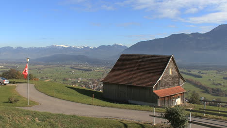 Switzerland-barn-and-alpine-valley