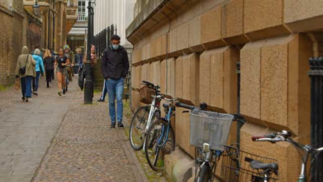 Tracking-Shot-Revealing-Pedestrians-On-Quaint-Old-English-Street-