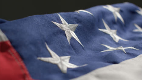 Tracking-Close-Up-Shot-Passing-Over-a-United-States-Flag