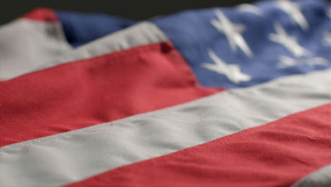 Tracking-Close-Up-Shot-Passing-Over-the-United-States-Flag