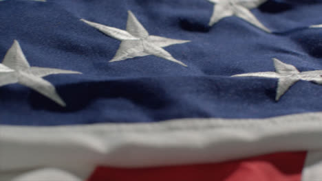 Tracking-Close-Up-Shot-Passing-Over-American--Flag