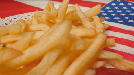 Sliding-Shot-Over-Plate-of-Fries-and-Ketchup