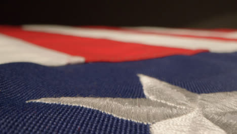 Sliding-Extreme-Close-Up-Shot-Over-United-States-Flag