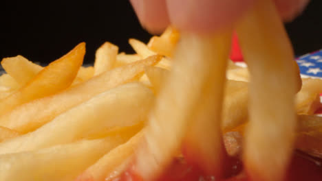 Sliding-Shot-Along-United-States-of-America-Flag-Past-a-Plate-of-Fries