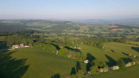Drone-Shot-Flying-High-Over-Rolling-Cotswold-Hills