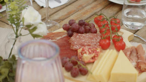 Tracking-Close-Up-Shot-Over-Food-On-Alfresco-Dining-Table-