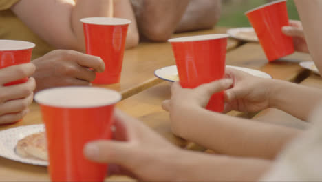 Close-Up-Shot-of-Red-Beer-Cups-Sitting-On-a-Table-