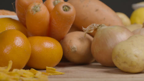 Sliding-Shot-Along-Rustic-Wood-Table-of-Fruit-and-Vegetables-11