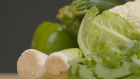 Sliding-Shot-Revealing-Pile-of-Green-Vegetables