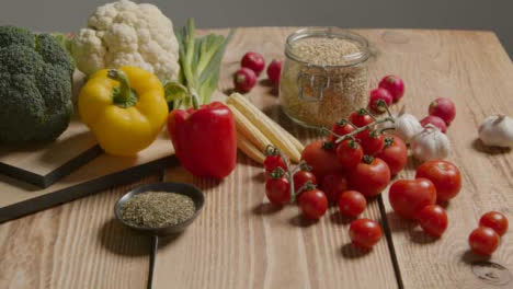 Tracking-Shot-Passing-Over-Rustic-Wooden-Table-with-Vegetables-On-It-03
