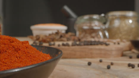 Extreme-Close-Up-Tracking-Out-Shot-of-Spices-and-Grains-on-Table