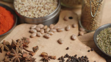 Overhead-Tracking-In-Shot-of-Herbs-and-Spices-on-Table