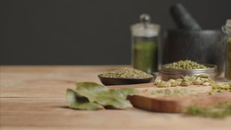 Sliding-In-Shot-to-Herbs-and-Grains-on-Table