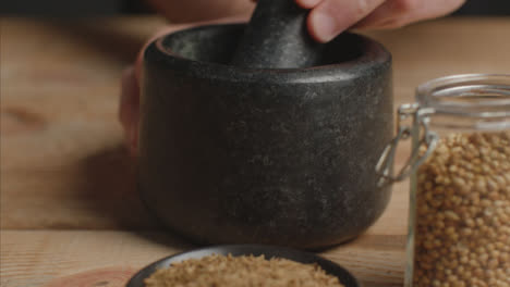Tracking-In-Shot-from-Cumin-to-Mortar-and-Pestle-on-Table