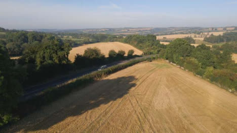 Drone-Shot-Panning-Up-Over-Rural-Fields