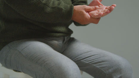 Close-Up-Shot-of-Senior-Man-Experiencing-Severe-Hand-Pain