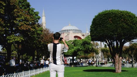 Wide-Shot-of-Young-man-Taking-Photos-of-Hagia-Sophia-
