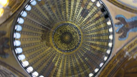 Low-Angle-Spinning-Shot-of-the-Hagia-Sophia-Dome-Ceiling
