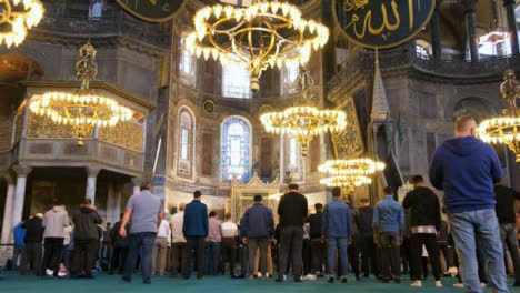 Low-Angle-Shot-of-People-Praying-in-the-Hagia-Sophia