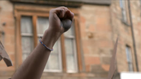 Close-Up-of-Activist-Fist-at-COP-26-Protest