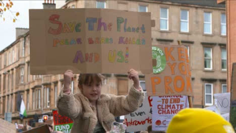 Young-Girl-Holding-Sign-at-COP-26-Protest