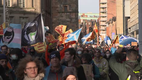 Handheld-Shot-of-Global-Warming-Protestors-Marching-In-Glasgow