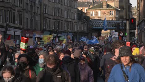 Handheld-Shot-of-Climate-Change-Demonstrators-Marching-Through-Glasgow-Streets
