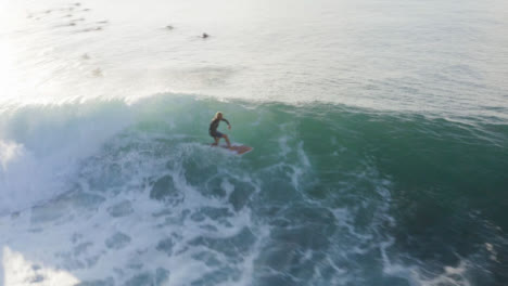Drone-Shot-of-Surfers-Surfing-Off-the-Coast-of-Bali