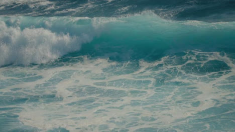 High-Angle-Shot-of-Waves-Crashing-Off-the-Coast-in-Bali