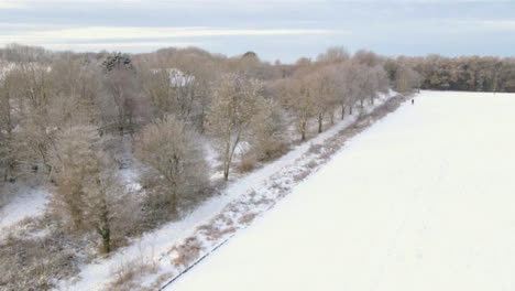 Drone-Shot-Panning-Over-Snow-Covered-Cotswold-Fields