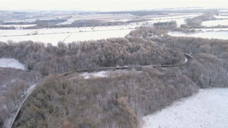 Drone-Shot-Flying-Over-Snowy-Countryside-Road-Part-1-of-2-