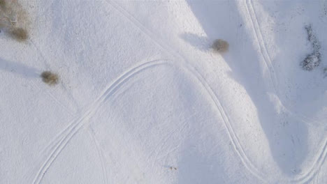 Drone-Shot-Looking-Down-On-Snow-Covered-Fields-Part-1-of-2