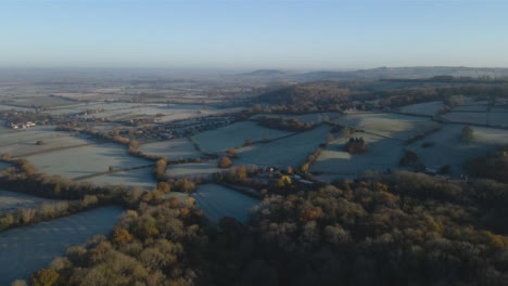 Drone-Shot-Flying-Over-Rural-Cotswold-Fields-On-Frosty-Morning