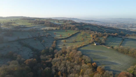 Drone-Shot-Flying-Over-Rural-Cotswold-Fields-During-a-Frosty-Morning